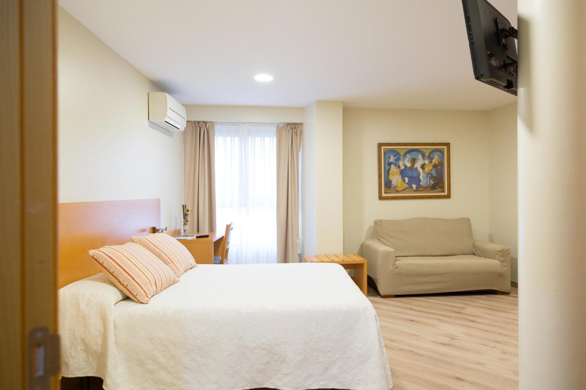 Apartamentos Playa De Cóbreces Exteriör bild