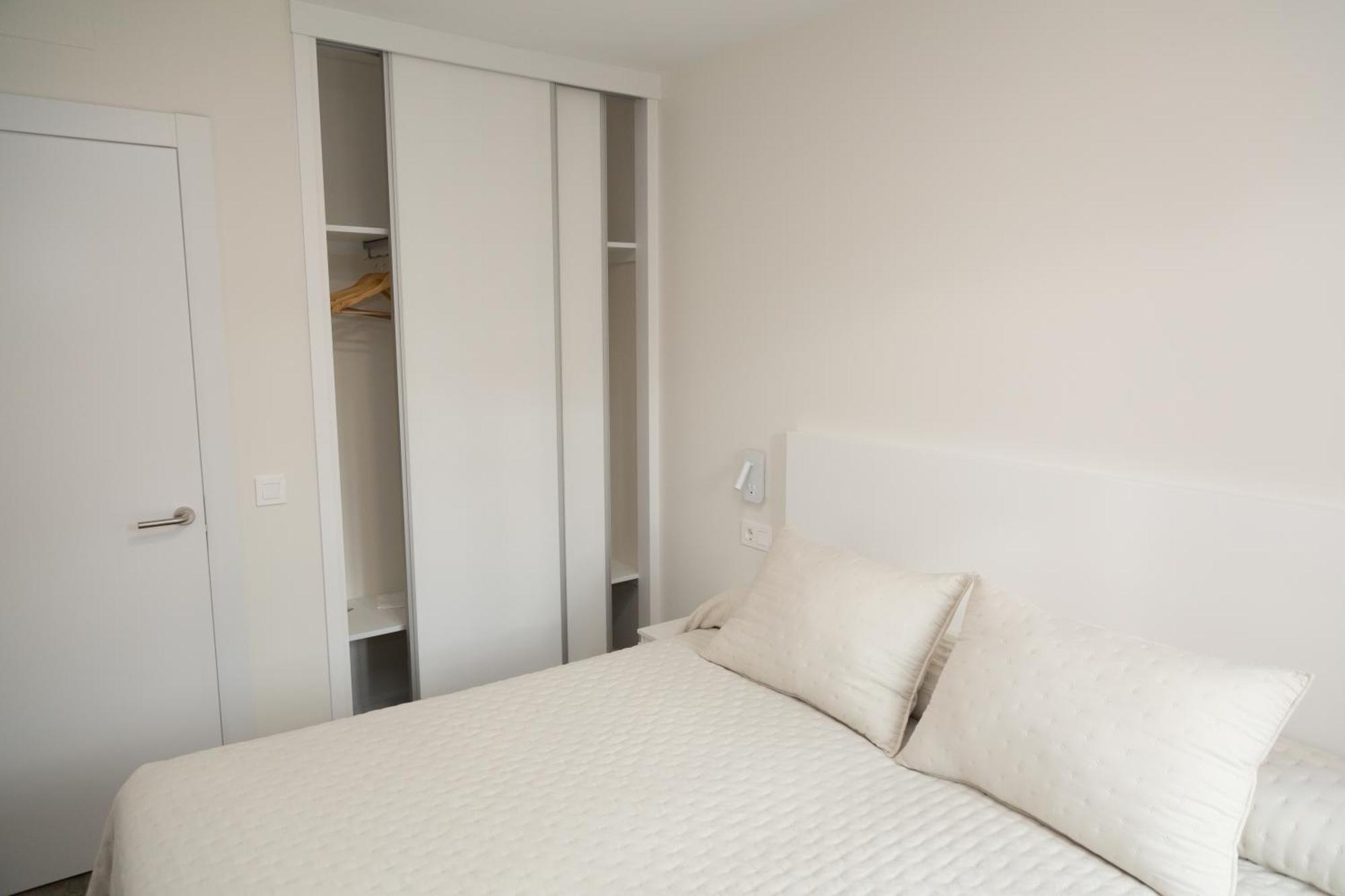 Apartamentos Playa De Cóbreces Exteriör bild