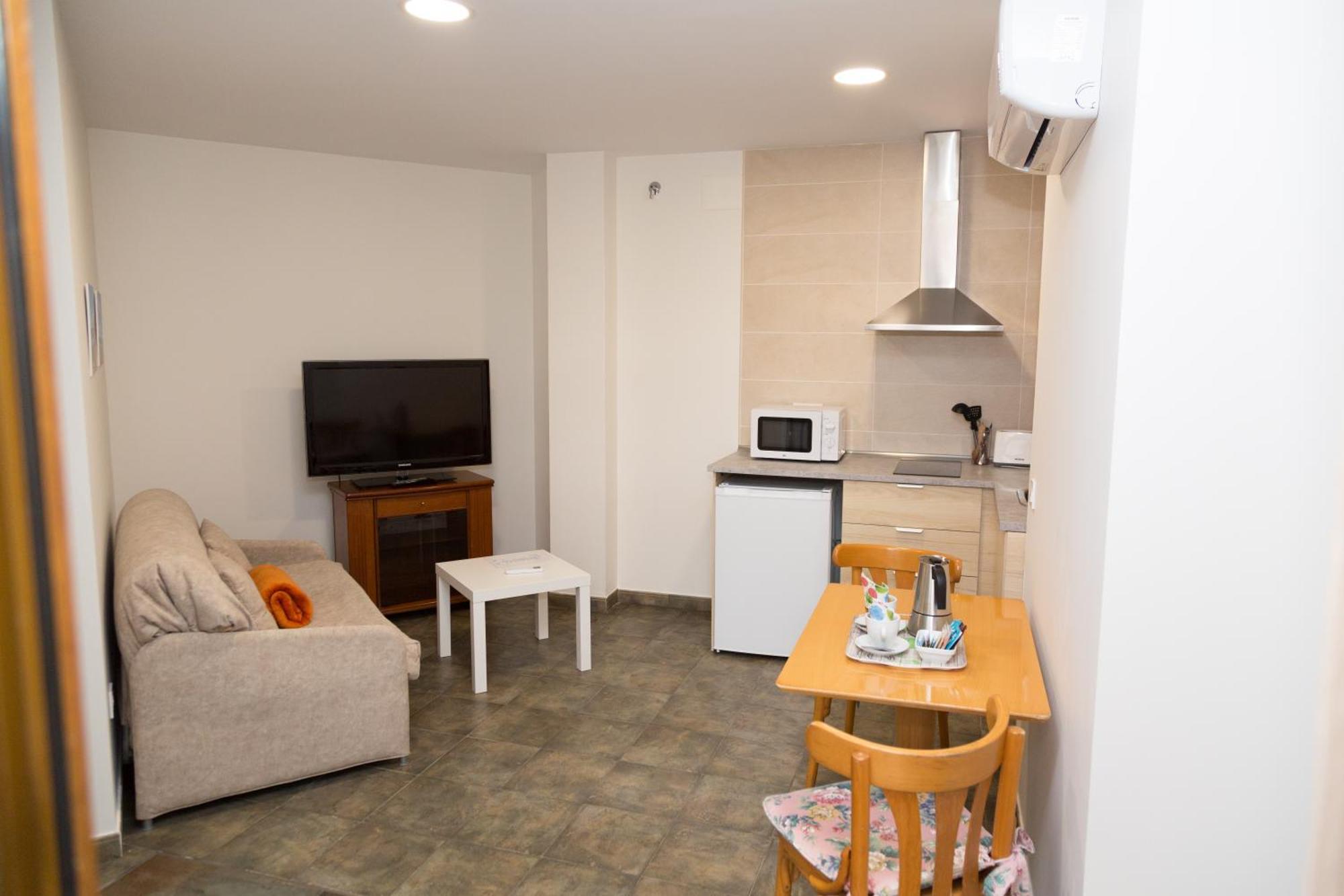 Apartamentos Playa De Cóbreces Exteriör bild