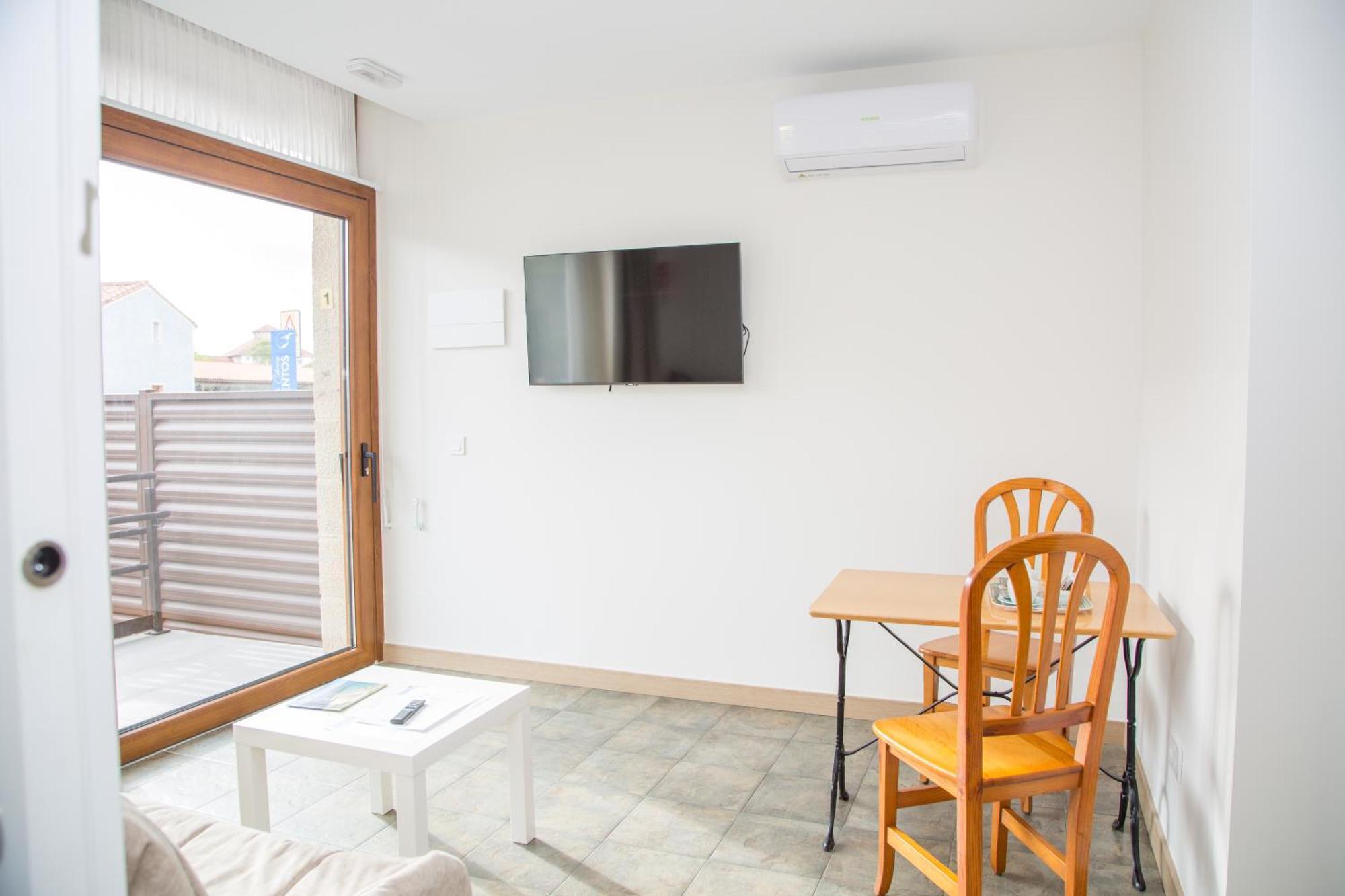 Apartamentos Playa De Cóbreces Exteriör bild