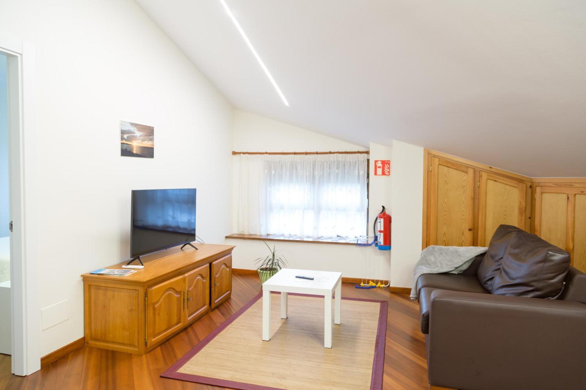 Apartamentos Playa De Cóbreces Exteriör bild