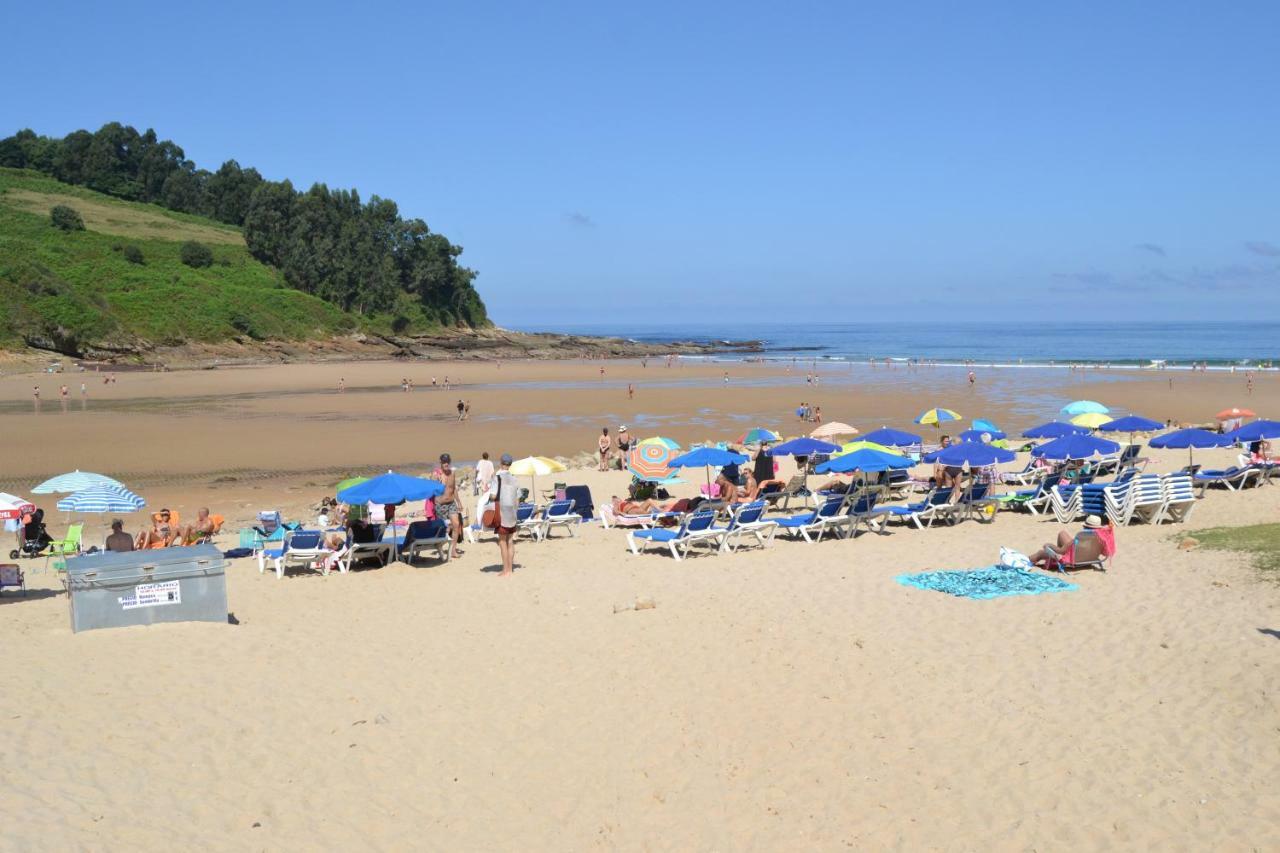 Apartamentos Playa De Cóbreces Exteriör bild